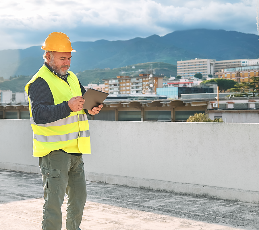 Facility manager using a commercial roof maintenance checklist